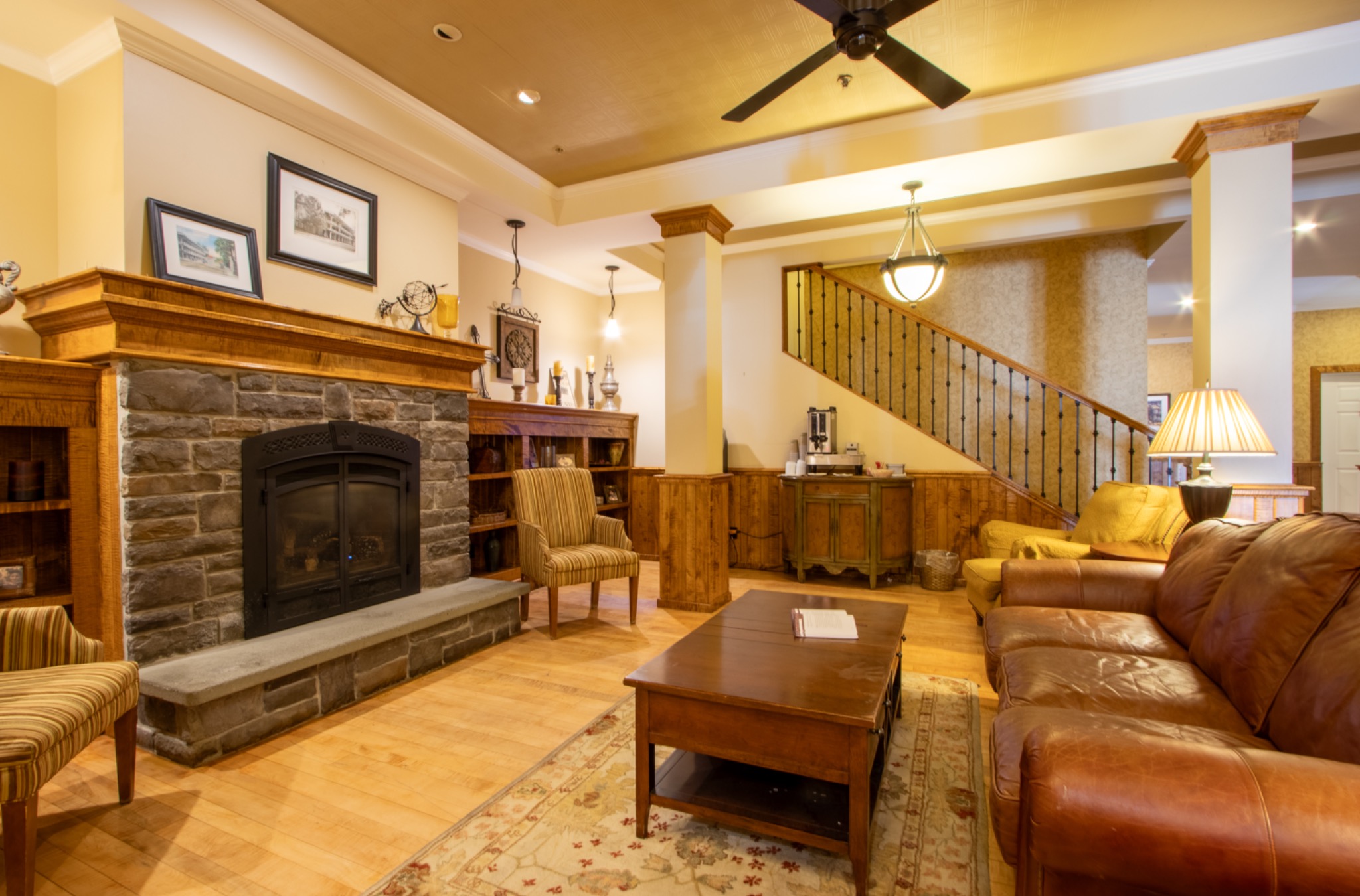 Lobby lounge with fireplace at Hancock House Hotel